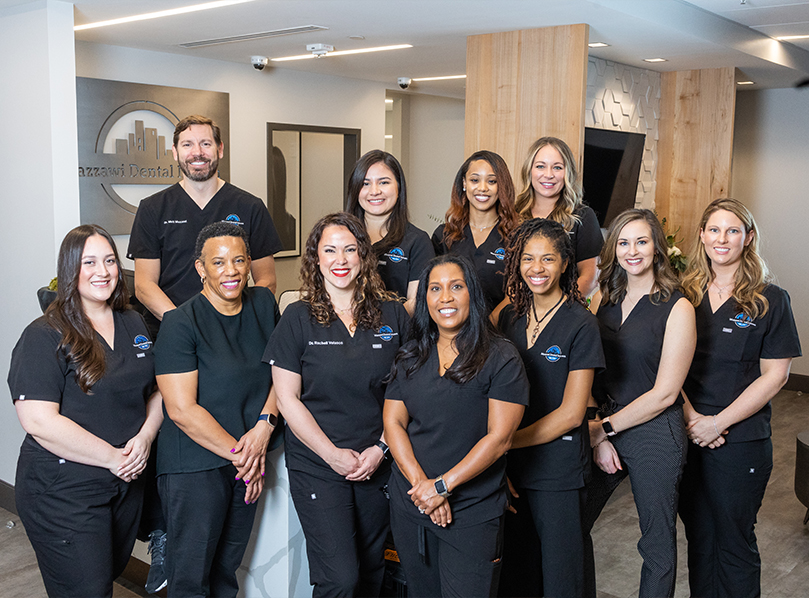 Smiling dentists and team members at Mazzawi Dental Intown